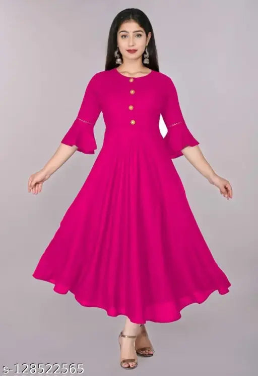 Printed long pink maxi dress with flared skirt, sleeves, and V-neck