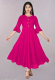 Printed long pink maxi dress with flared skirt, sleeves, and V-neck