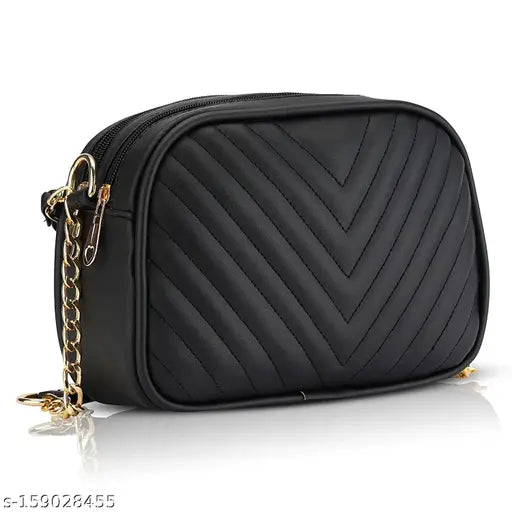 Quilted black sling bag with multiple pockets and a chain strap