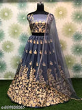 Embroidered net semi-stitched Lehenga Choli and lace dupatta, Indian bridal wear on display stand