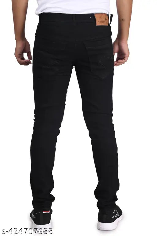 Stylish black cotton blend slim fit full-length jeans for men, solid pattern, party/festive wear on model