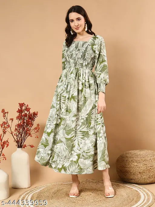 Green crepe three-quarter sleeve dress with printed net pattern, size M, made in India