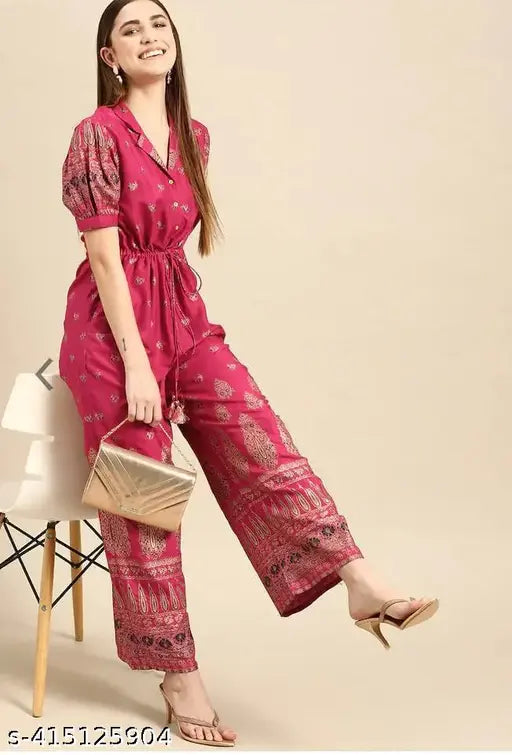 Red printed rayon jumpsuit on mannequin, features short sleeves and net pattern, size M, Indian origin
