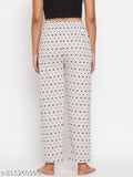 Grey and black polka dot women's pyjama pants with matching night shirt, cotton material