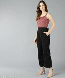 Women's white-dot printed pink viscose rayon jumpsuit, sleeveless with a printed net pattern on an Indian fashion mannequin