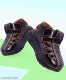 Black casual sandals with brown straps and white soles, designed for both boys and girls