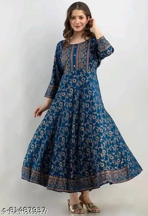 Blue printed long maxi gown with long sleeves, floral print, and flared style.