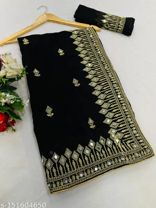 Gold embroidered georgette silk saree with black border and mirror work, heavy embellishment, lace bordered running blouse piece