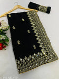Gold embroidered georgette silk saree with black border and mirror work, heavy embellishment, lace bordered running blouse piece