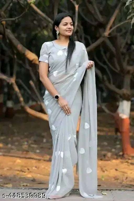Gray and white embroidered sari