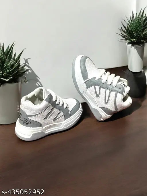 Gray canvas sneakers with white laces