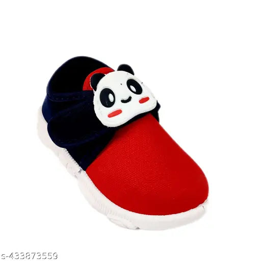 Red shoes with panda face embroidered on baby's shoe