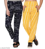 Yellow patterned sweatpants, black crop top, athletic style
