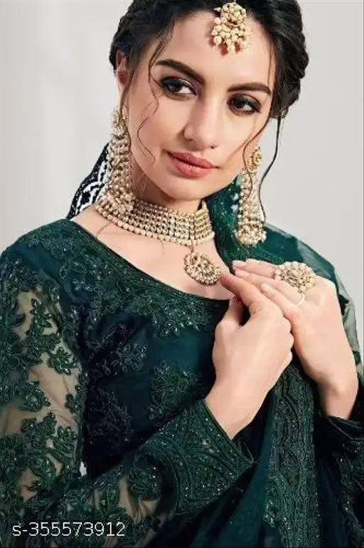 Embroidered net lehenga choli and dupatta set, semi-stitched in India" (103 characters)