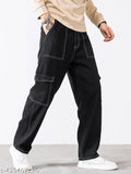 Dark wash denim jeans with cuffed legs and silver metal buttons