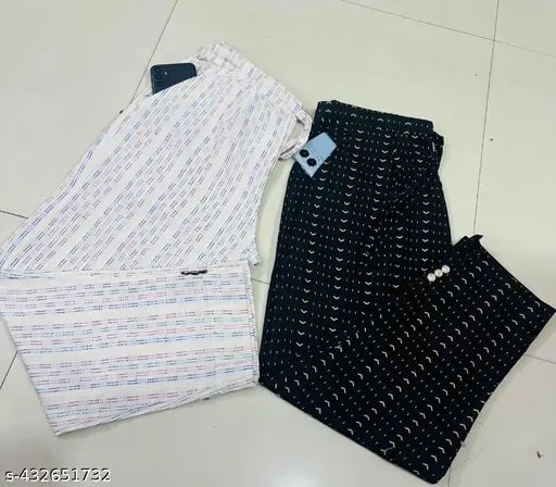Black and white patterned men's casual pants with zip closure, two front pockets