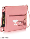 Pink leather shoulder bag with metal zipper and tassel detail