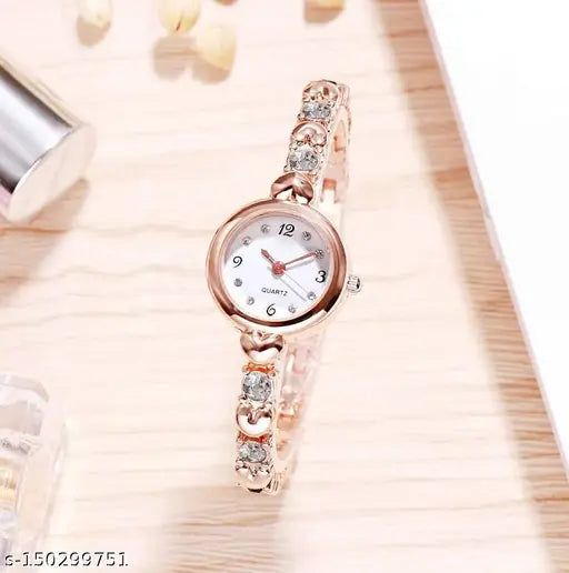 Analogue gold watch, stainless steel band, quartz movement, women's fashion accessory