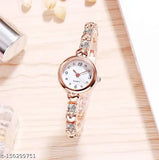 Analogue gold watch, stainless steel band, quartz movement, women's fashion accessory