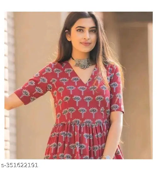 Mid-length Anarkali kameez with floral pattern, worn by person, suitable for women's ethnic wear