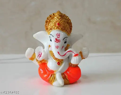 Handcrafted Ganesha statue, 6cm polyresin showpiece for home decor or car dashboard, vibrant colors, ideal for festivals and worship areas