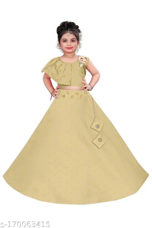 Tussar Silk and taffeta sleeveless baby girl lehenga choli by Manav Creation, ethnic motif design on display