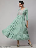 Light blue rayon kameez with round neck, long sleeves, and flared ankle length