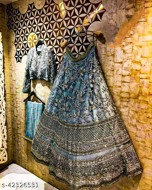 Trendy satin-net embroidered lehenga with choli and dupatta, India origin