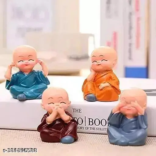 Four ceramic Buddha statues, Indian origin, set of 4 with dimensions 2cm x 2cm x 1cm
