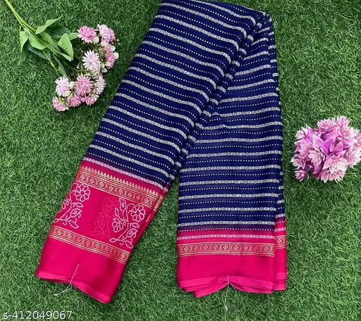 Moss chiffon foil printed party saree with striped net detail, Indian wedding and festival wear