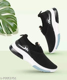 Black and white slip on running shoes with Nike swoosh for boys or girls
