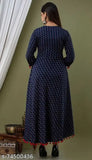 Colorful rayon party dress with embroidery design, long sleeves, high neckline, flared skirt, side pockets