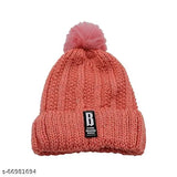 Pink knit beanie hat with thick cotton lining and a pom-pom