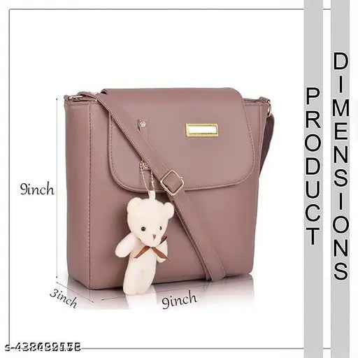 Fashionable sling bag, ideal for women and girls. Leather construction with gold accents. Practical side handbag, great for travel or weddings