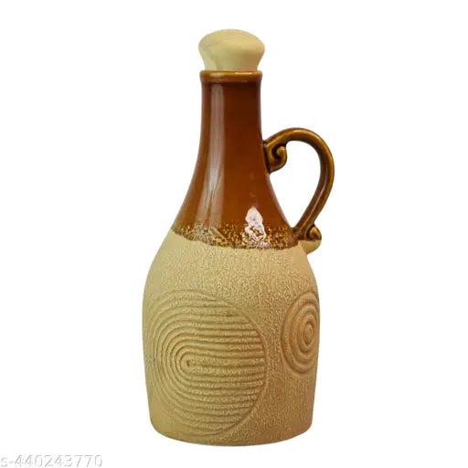 A ceramic oil dispenser bottle with a handle, suitable for kitchen use, can hold up to 1000 milliliters, and is safe for microwave heating. Ideal for storing cooking oils. Capacity: 1000 Ml. Pack of 2