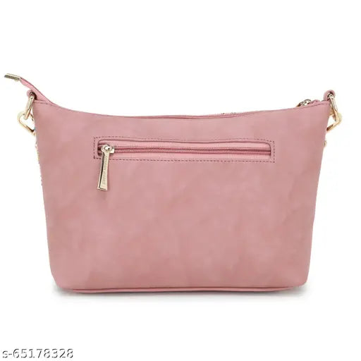 Pink crossbody bag with adjustable strap and zip closure