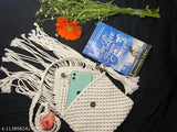White macrame sling bag with tassels and two pockets