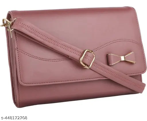 Pink satin sling bag with a tie closure