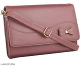 Pink satin sling bag with a tie closure