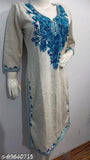 Woolen kurti with light grey embroidery and blue paisley embroidery on a woman's mannequin
