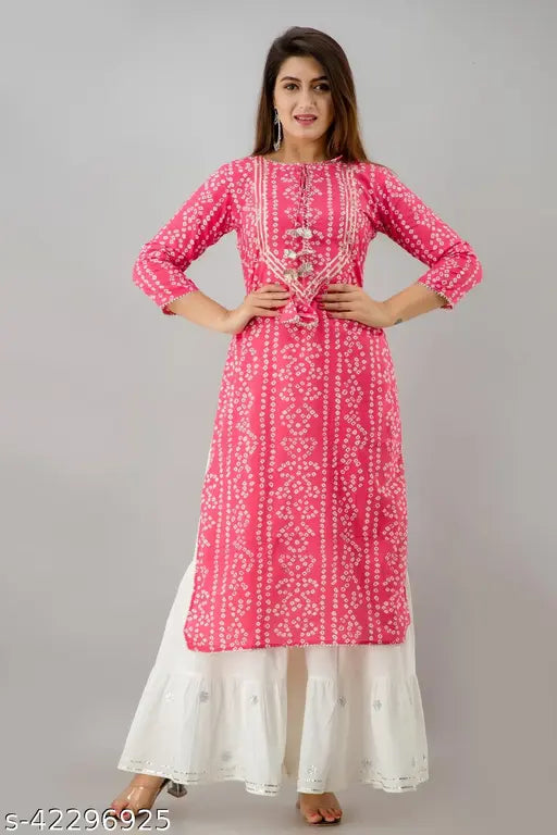 A long pink and white bandhej straight kurta on a woman