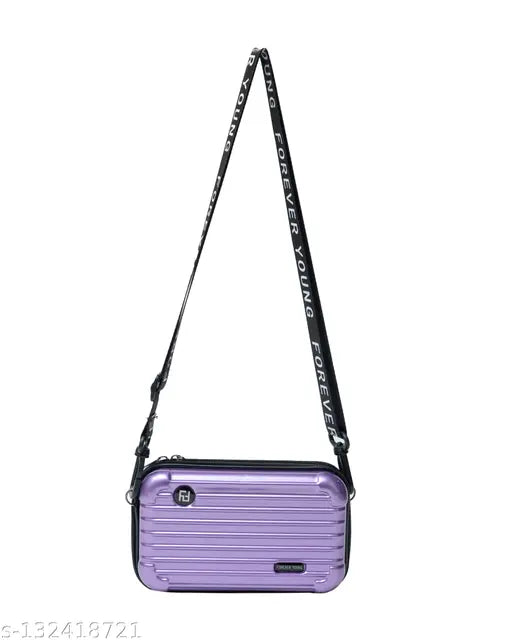 The image shows a purple sling bag with a black shoulder strap and a small, possibly white or light grey, rectangular logo patch on the front. It has a simple, boxy design with a single, elongated zipper closure running across its upper edge