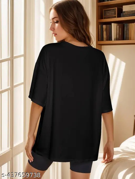 Oversized t-shirt for women, black with thin fabric, featuring half-sleeves. Ideal for casual wear or gym