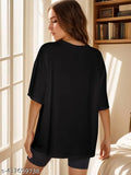 Oversized t-shirt for women, black with thin fabric, featuring half-sleeves. Ideal for casual wear or gym