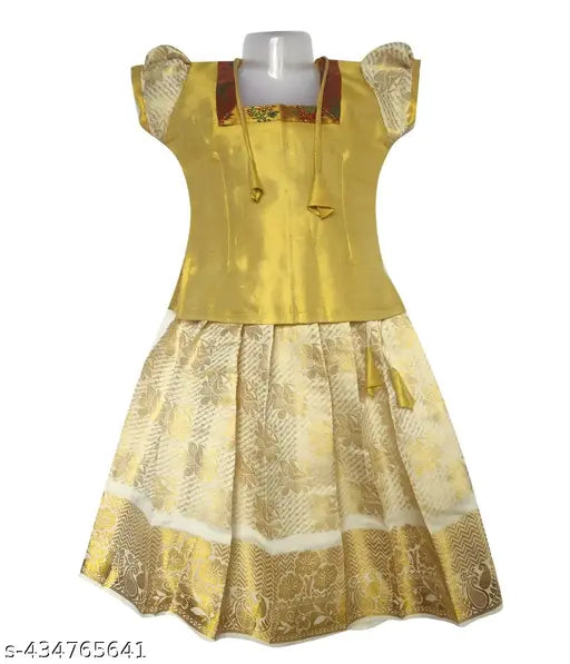PKD Girls Fashion ethnic jacquard Pattu Pavaadai, cotton lehenga with Aari Work, short sleeves, solid pattern, in various sizes from 0-6M to 13-14Y. Indian traditional dress for girls on display