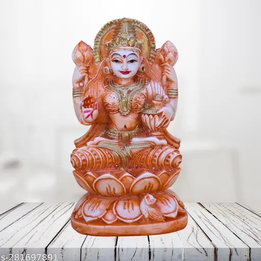Orange marble dust Laxmi Mata idol, intricate ceramic figure from India
