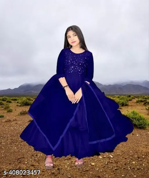 Vintage net gown set by B R Enterprise, featuring three-quarter sleeves in varying sizes: 5-6 years (26in/30in), 6-7 years (26in/30in), 7-8 years (31in/45in), 8-9 years (31in/45in), 9-10 years (31in/45in), 10-11 years (32in/46in), 11-12 years (32in/46in), 12-13 years (36in/50in), 13-14 years (36in/50in), and 14-15 years (36in/51in). Ideal for special occasions