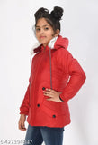 A young girl is wearing a bright red jacket with a zipper and pockets