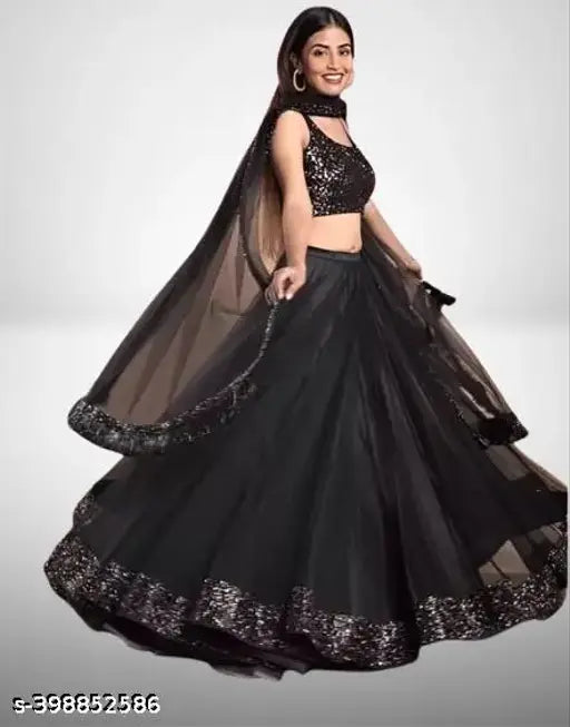 Black velvet and net Lehenga Choli with blouse and dupatta set - embellished top, solid bottom & dupatta. Semi-stitched, un-stitched, and free size options available for this Indian indo-western party wear design