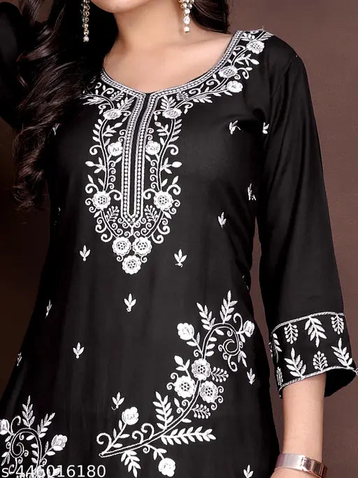 Women's embroidered Viscose Rayon Kurta Set with matching pants - 3/4 sleeves, single size, embroidered net design, available in S-XXXL. Indian handcrafted traditional attire on display